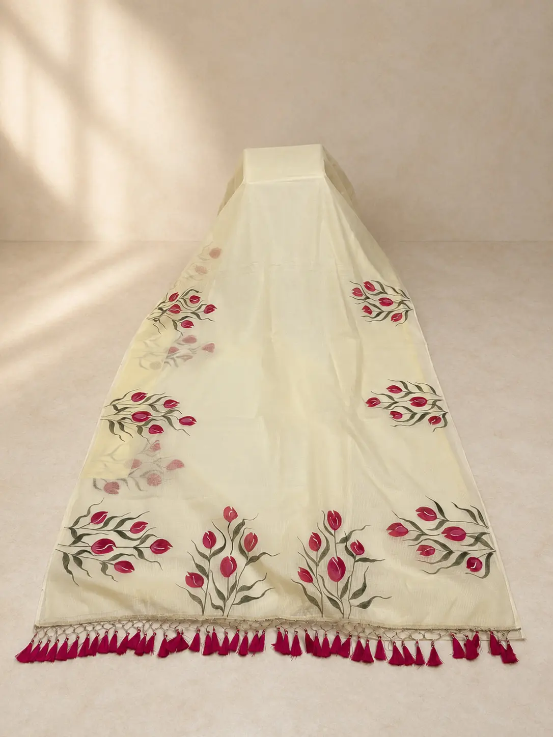 The complete pale-lemon Moner Mone saree with hand-painted pink tulips